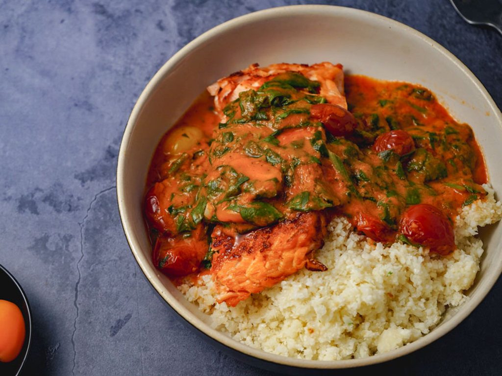 Salmon in a red pepper sauce